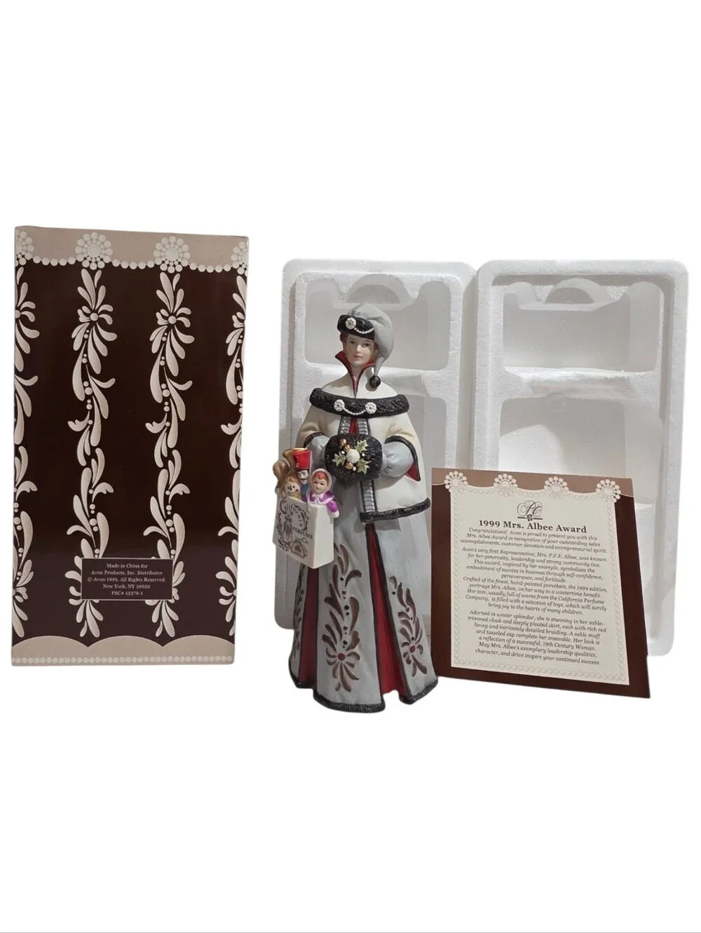 1999 Avon Mrs. P.F.E. Albee President's Club Award porcelain figurine.